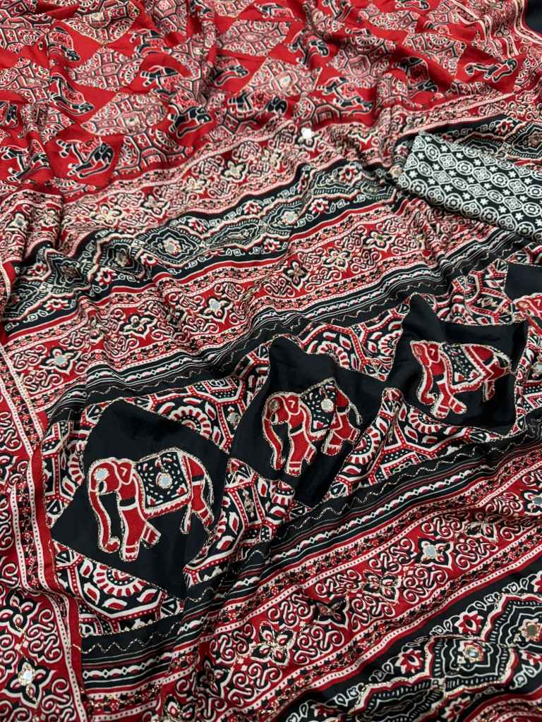 SOFT CREPE SILK AJARAKH PRINT ZARI AND MIRROR WORK SAREE AT WHOLESALE PRICE 