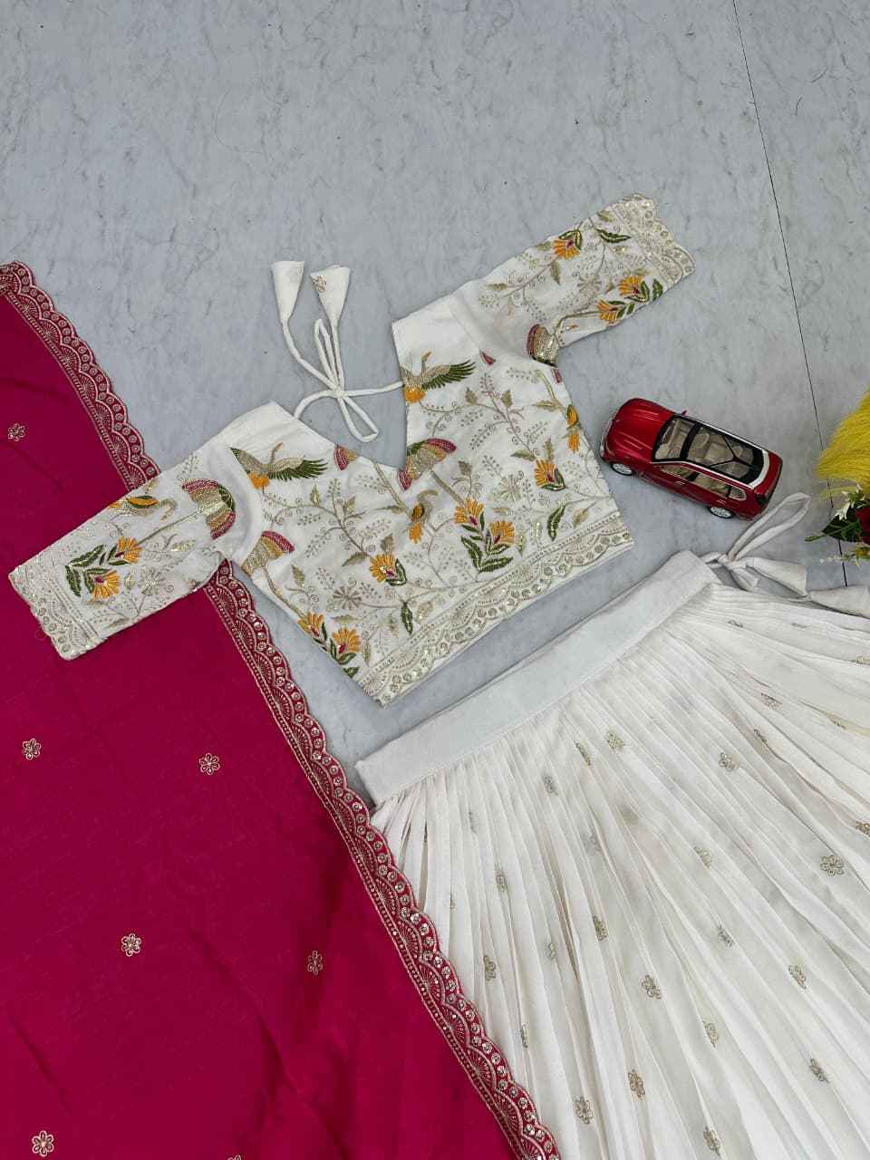 VICHITRA SILK HEAVY THREAD EMBROIDERY AND SEQUENCE WORK LEHENGA CHOLI AT WHOLESALE PRICE