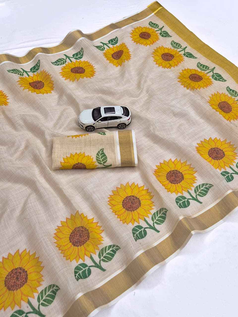 ONAM SPECIAL LINEN GOLD JARI KERALA BORDER SAREE